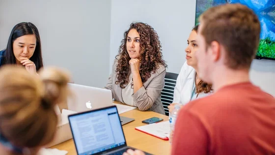 Medical school student on laptop in class