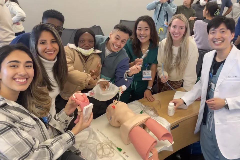 UCLA anesthesiologist Dr. Jason Lee leading an anesthesiology learning activity for students 